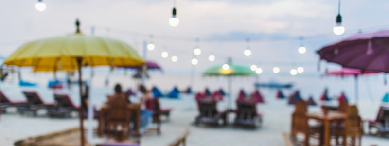 people sitting in a beach resort, Bali.