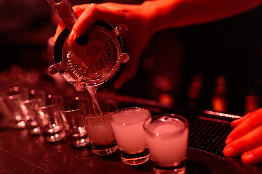 pouring shots at a bar